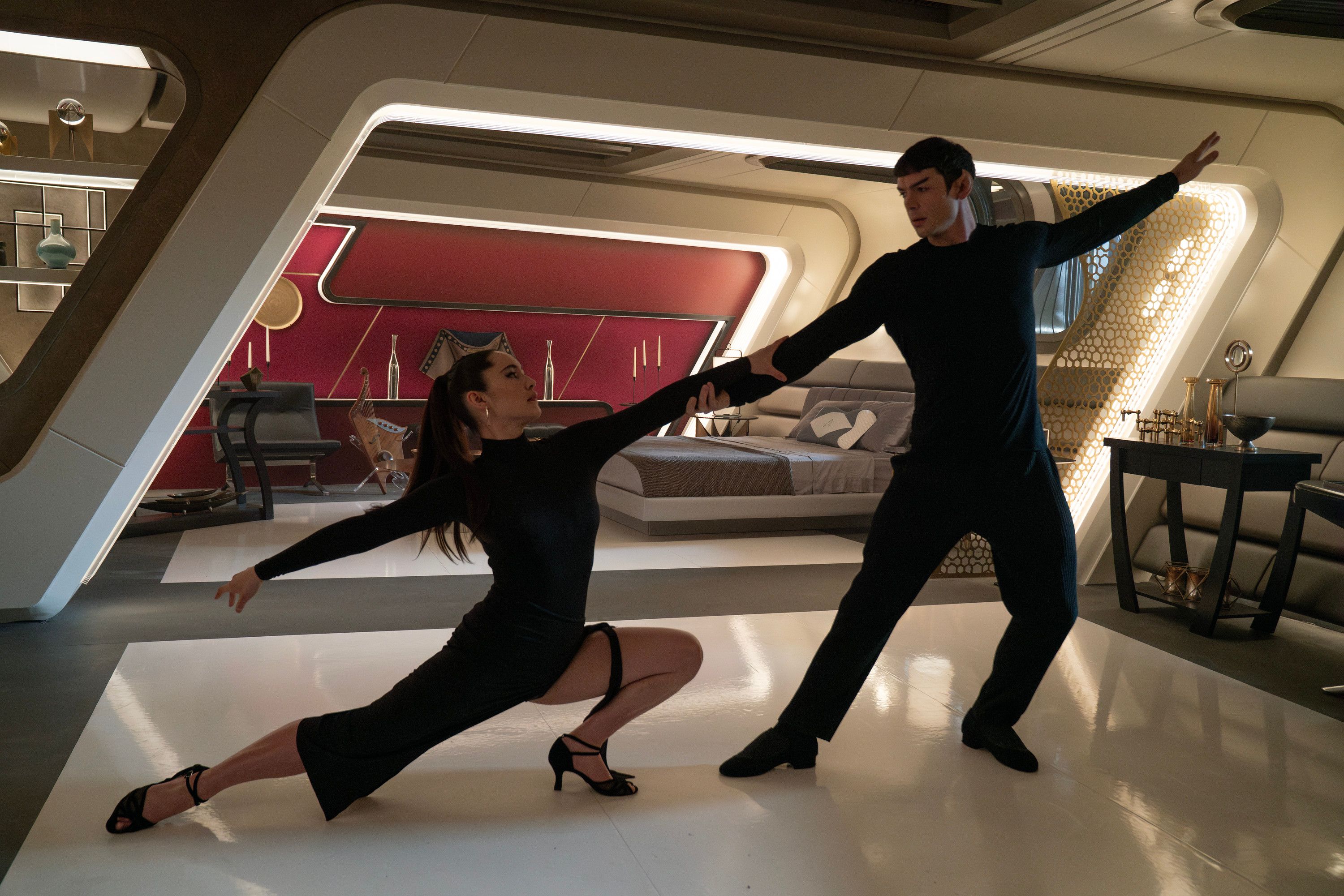 Christina Chong as Laían and Ethan Peck as Spock dance together in Star Trek: Strange New Worlds