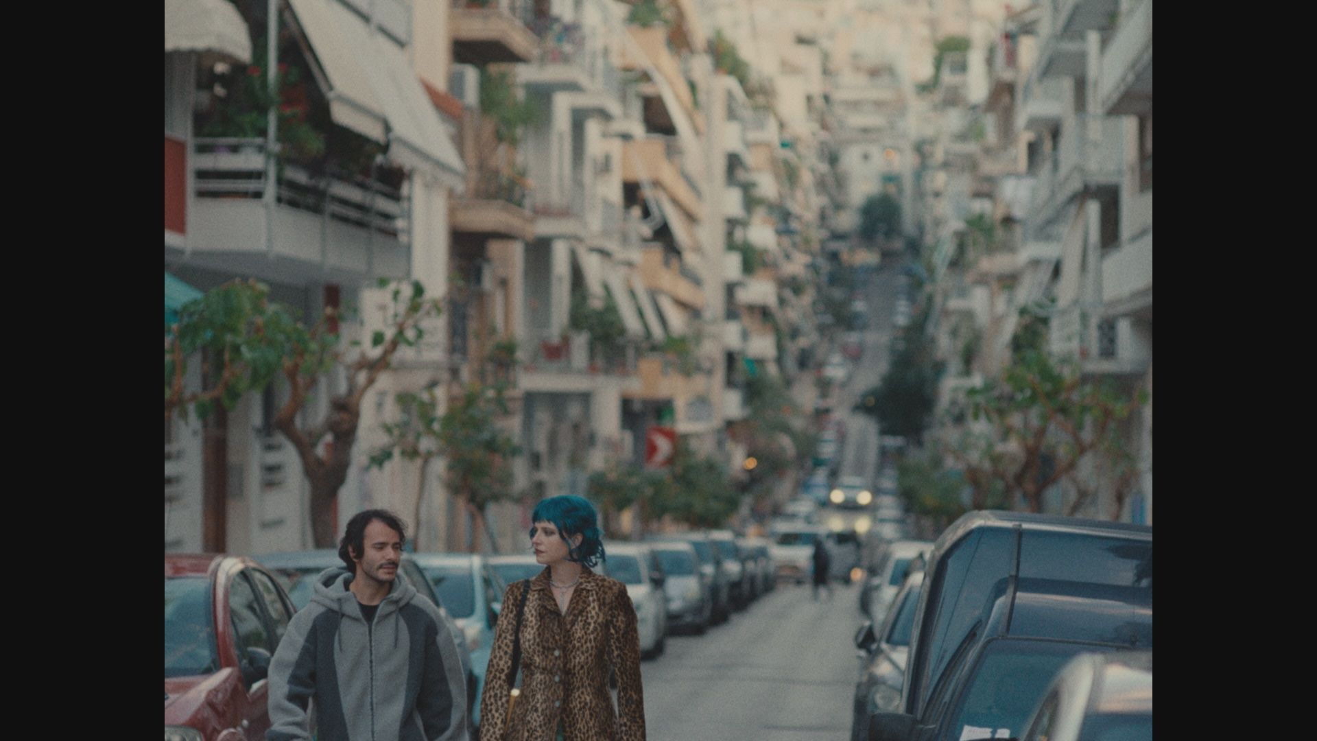 Two ghosts walking through Athens in How to Shoot a Ghost 