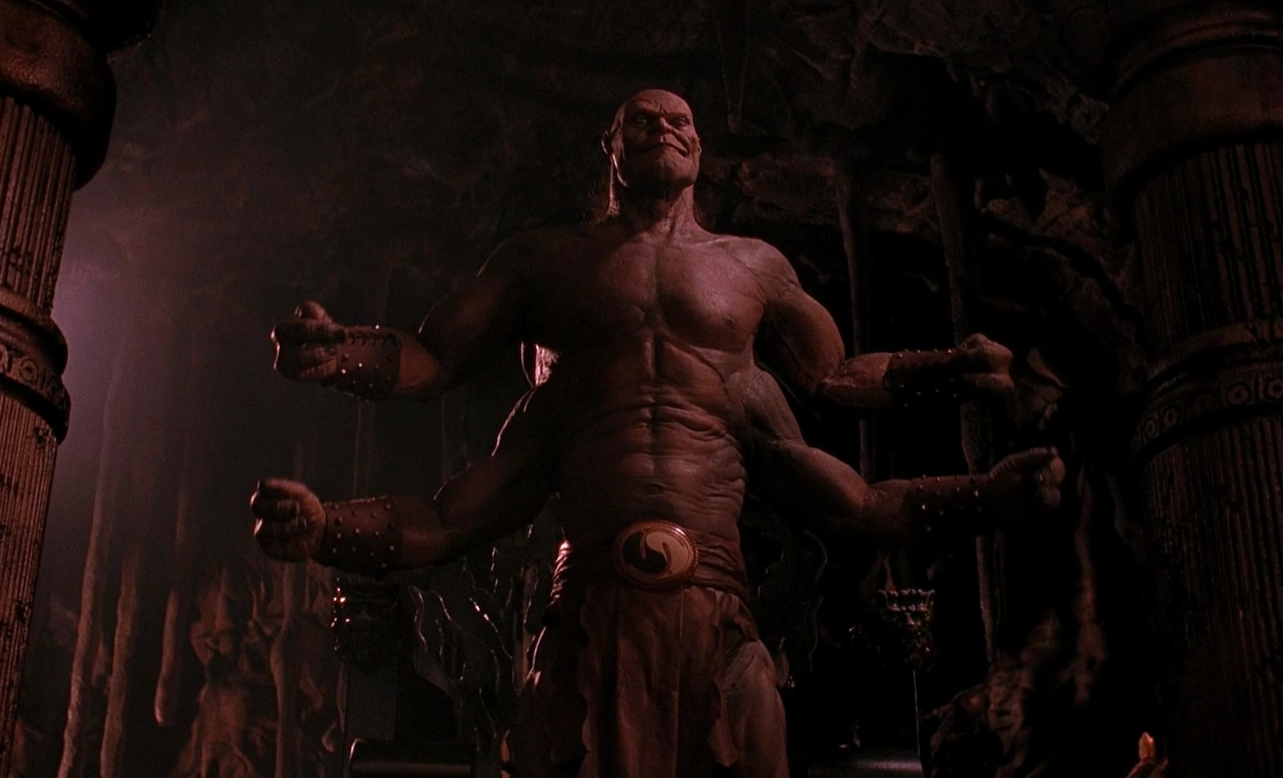 The fantastical monster Goro poses in Mortal Kombat, flexing his four arms.
