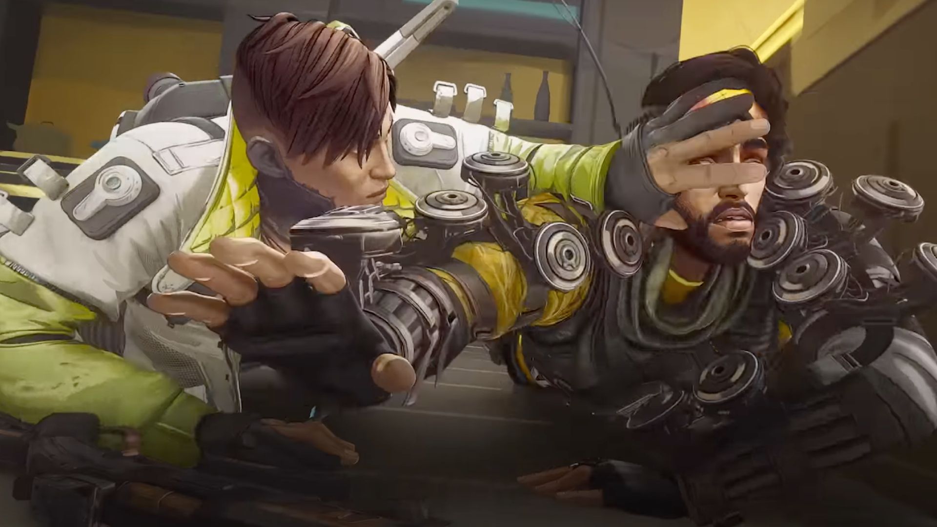 Mirage and Crypto wrestle on the floor during a match.