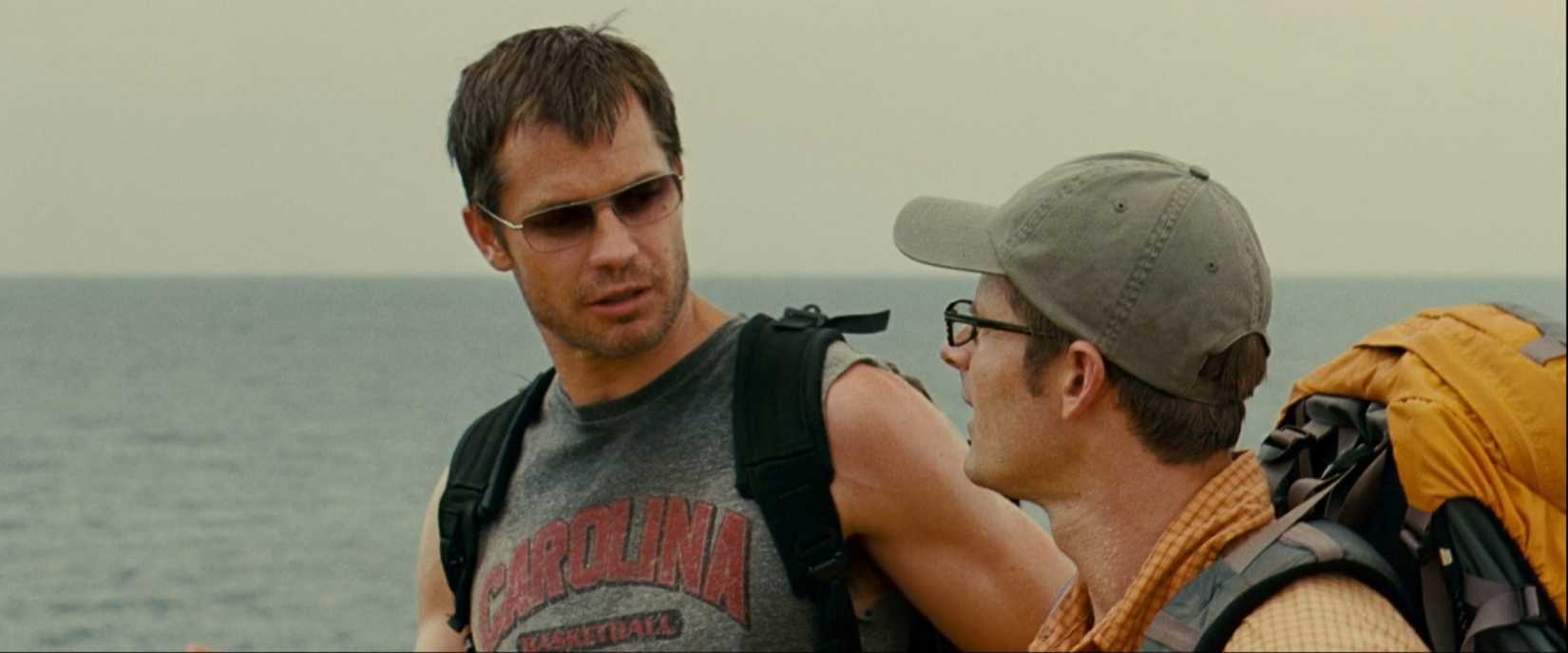 Timothy Olyphant chats with a vaguely uncomfortable Steve Zahn while backpacking in the thriller A Perfect Getaway