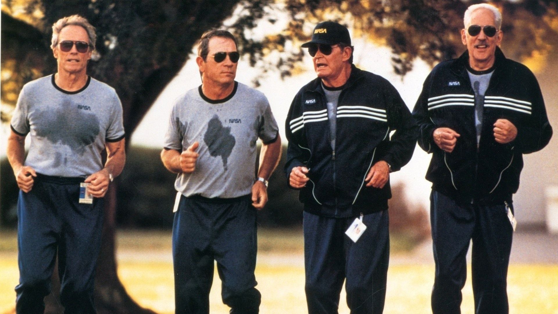Clint Eastwood, Tommy Lee Jones, James Garner, and Donald Sutherland sweating through training in a scene from Space Cowboys