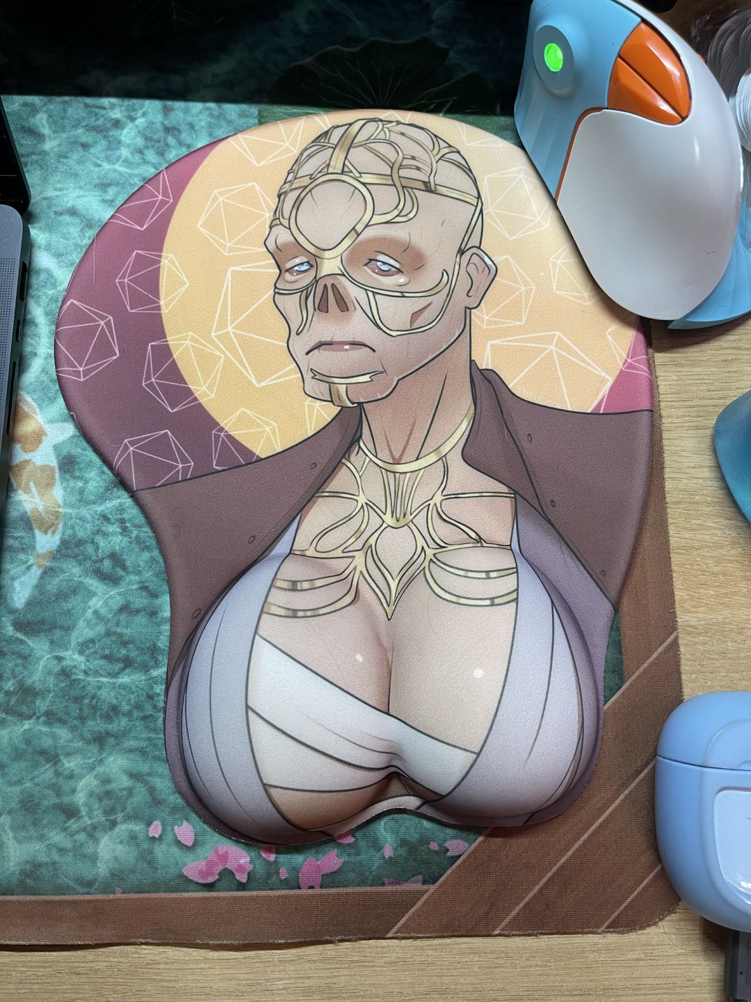 Lightfoot's 3D mousepad, which he designed, features art of Withers sporting a large chest, just like he does in Lighfoot's mod.